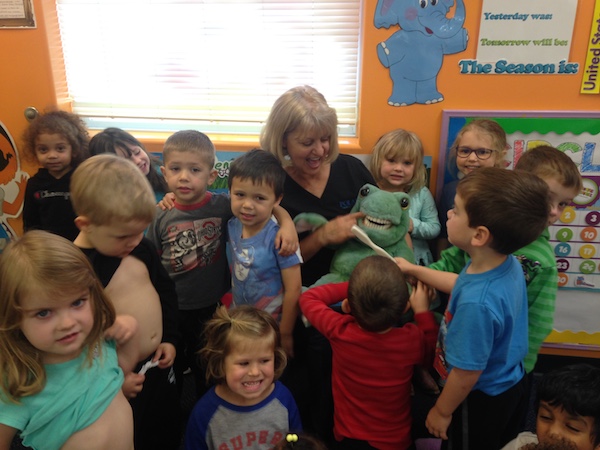 Group of Kids Learning About Teeth