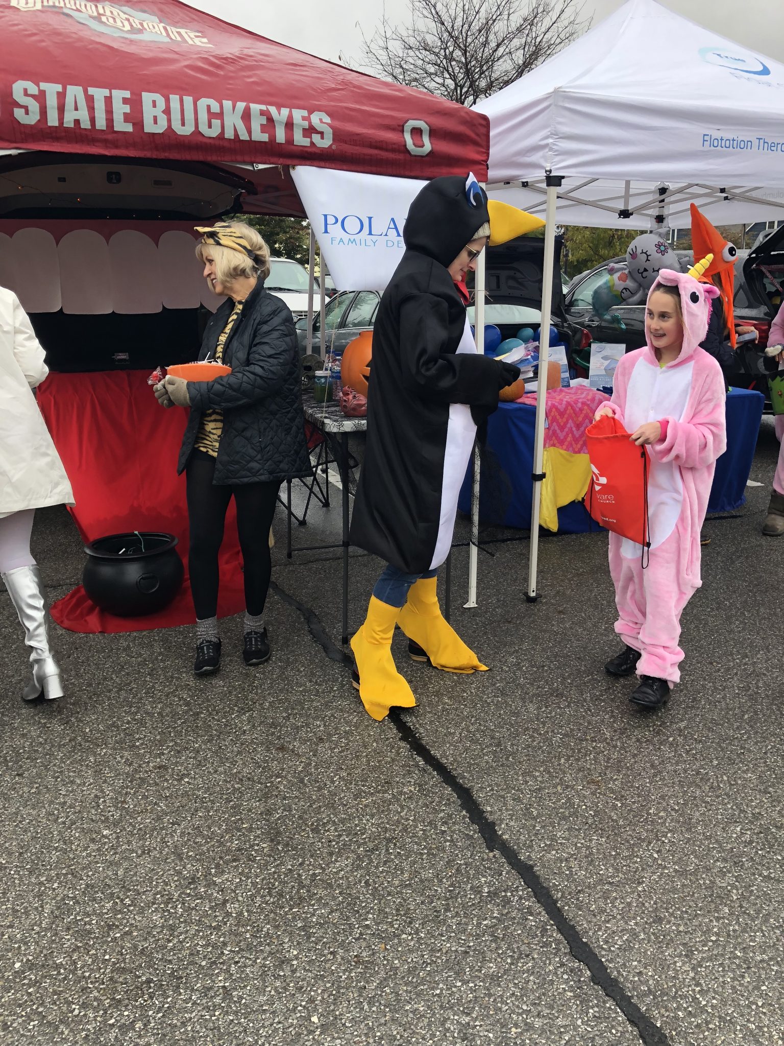 Handing Out Candy Dressed Up as Penguin